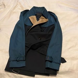A dark blue Coach Trench coat. Only worn twice in great condition!!